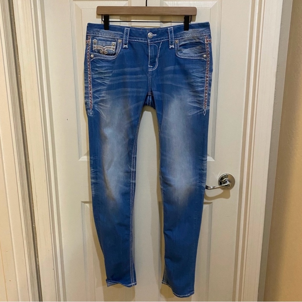 Rock Revival Skinny Jeans with Fleur-de-lis flap pockets